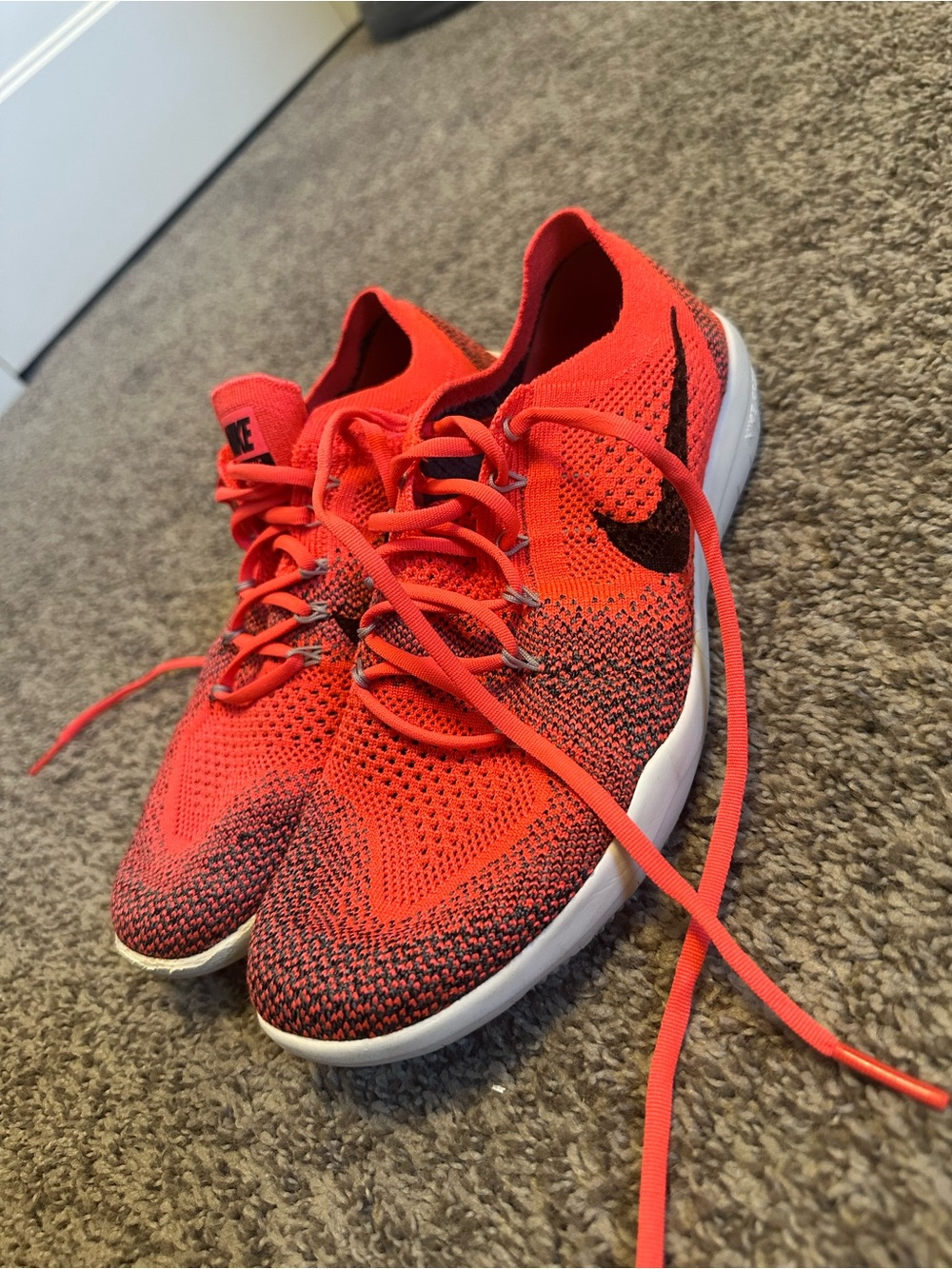 Nike Pink and Black Flyknit Running Shoes